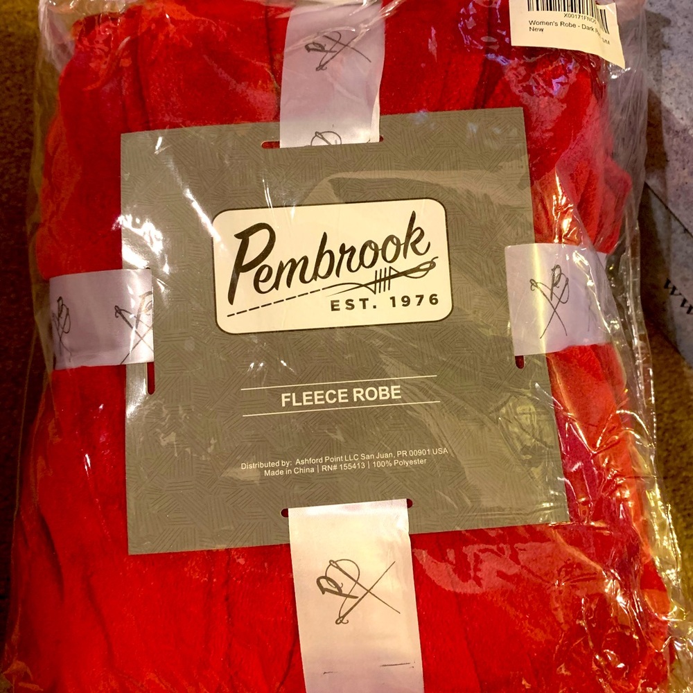 Brand new fleece robe still in bag.